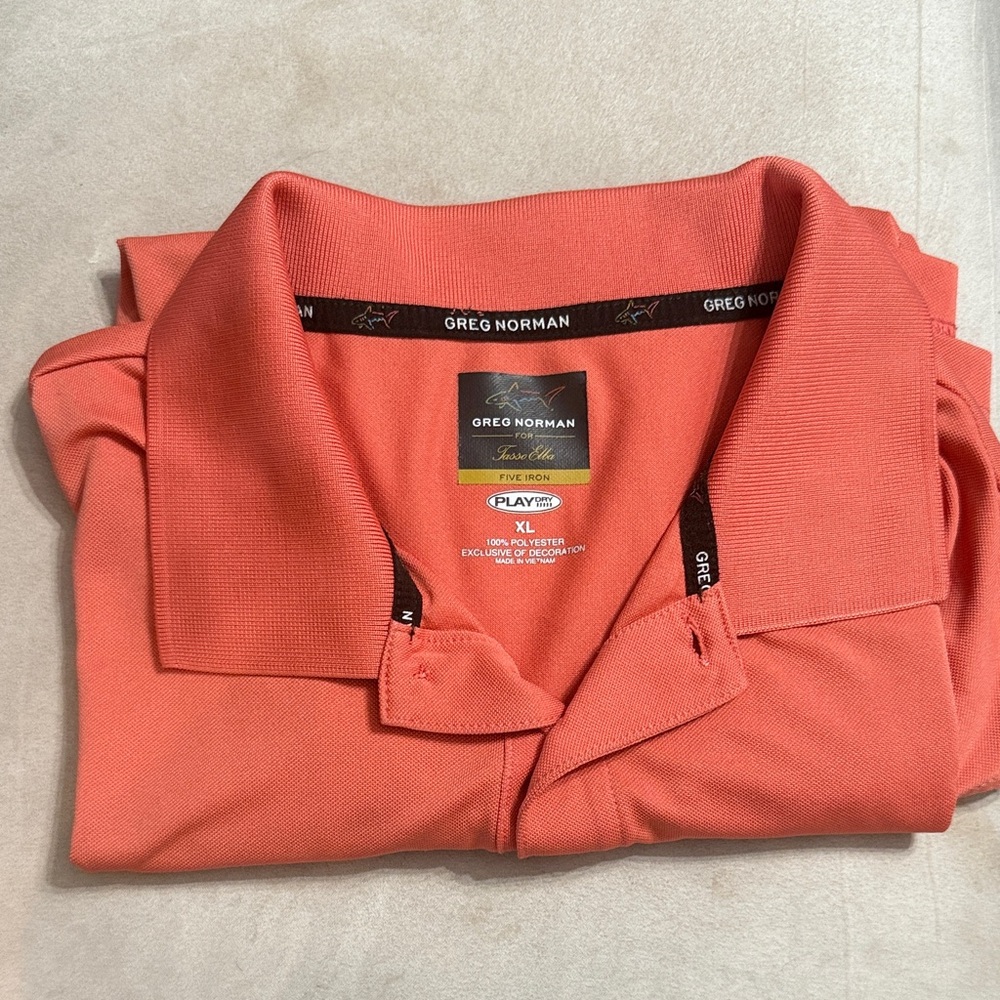 Greg Norman Collection Men's Polo in Vibrant Orange
